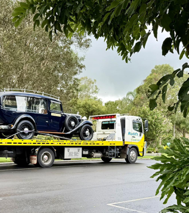 Tow truck assisting broken down car in Brisbane